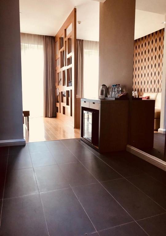 Kuchyň nebo kuchyňský kout v ubytování Pefaco Hotel Maya Maya