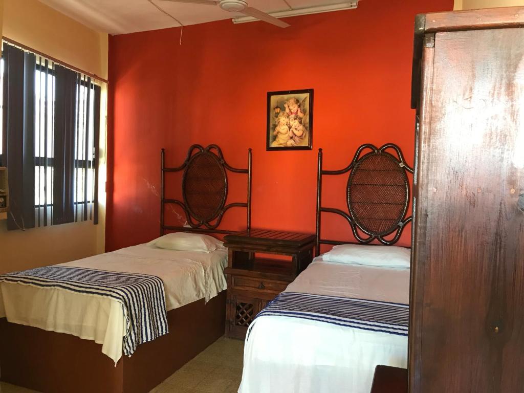 Postel nebo postele na pokoji v ubytování Hotel Estrella del Mar