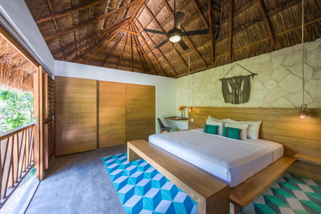 Кровать или кровати в номере Prana Boutique Hotel Tulum