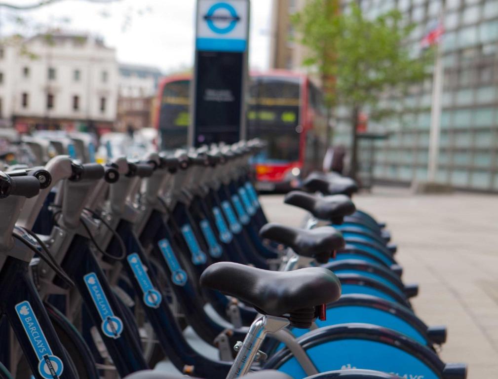 a row of bikes parked on a city street at The Z Hotel Victoria in London