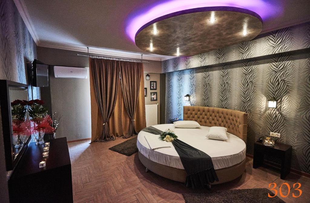 Postel nebo postele na pokoji v ubytování Atlantic Hotel