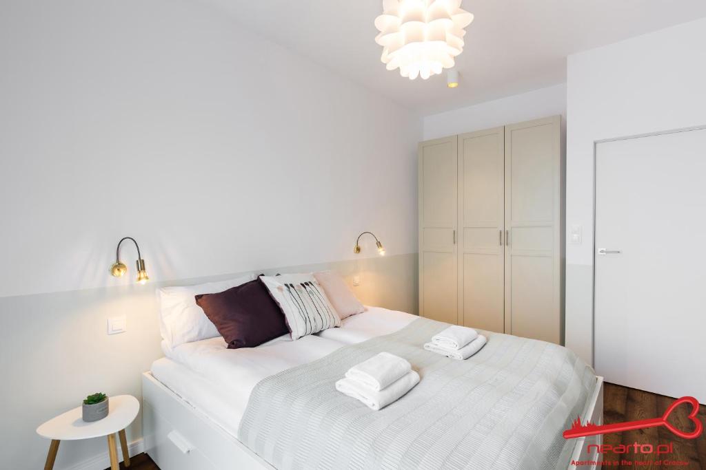Posteľ alebo postele v izbe v ubytovaní Apartments Nearto Old Town Rakowicka