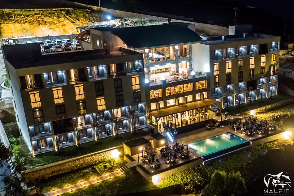 an aerial view of a hotel at night at Satama Hotel in Cap-Haïtien