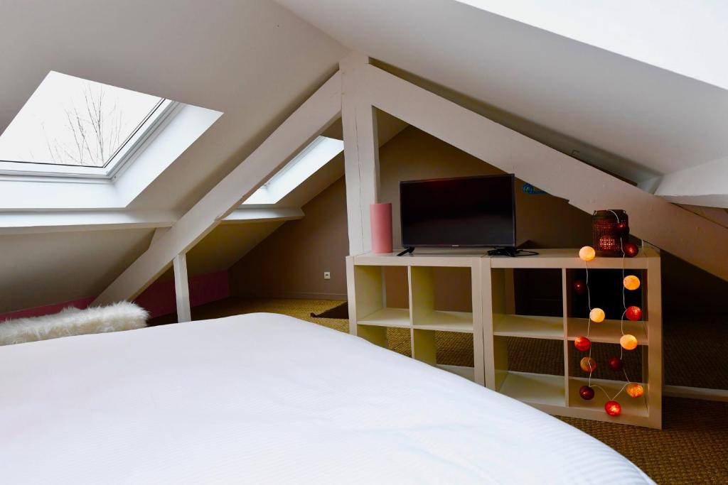 TV a/nebo společenská místnost v ubytování Appartement Week-end