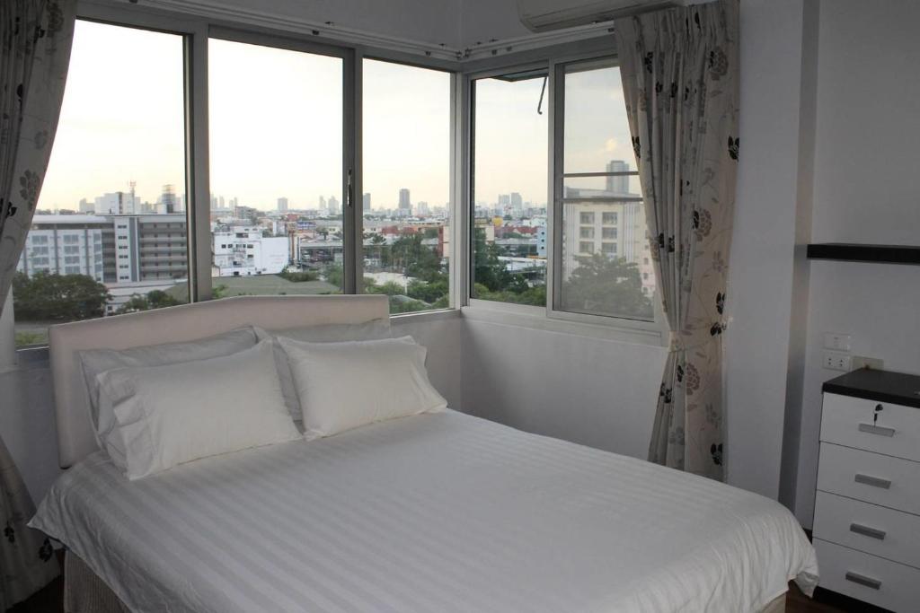 Cama o camas de una habitación en Penthouse by JJ