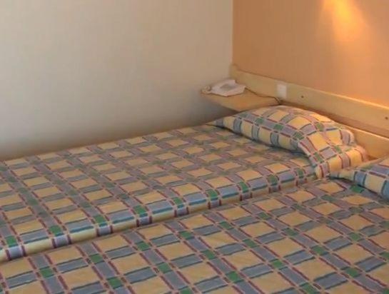 Łóżko lub łóżka w pokoju w obiekcie Nautilus Barbati