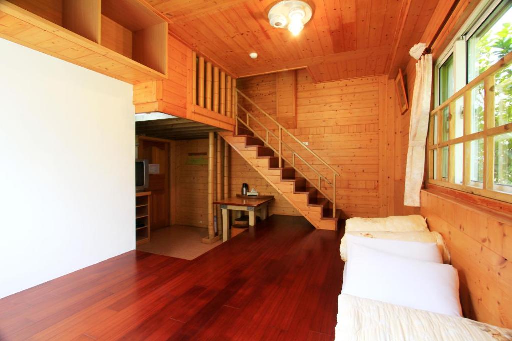 Postel nebo postele na pokoji v ubytování Yi Xin Homestay