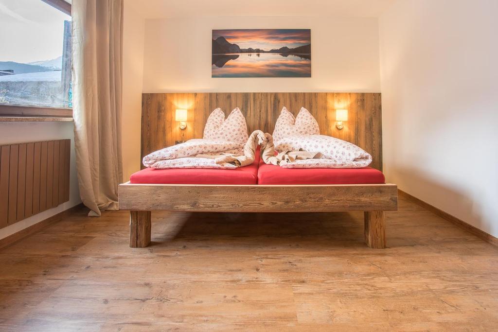 Posteľ alebo postele v izbe v ubytovaní Chalet Holzerstubn