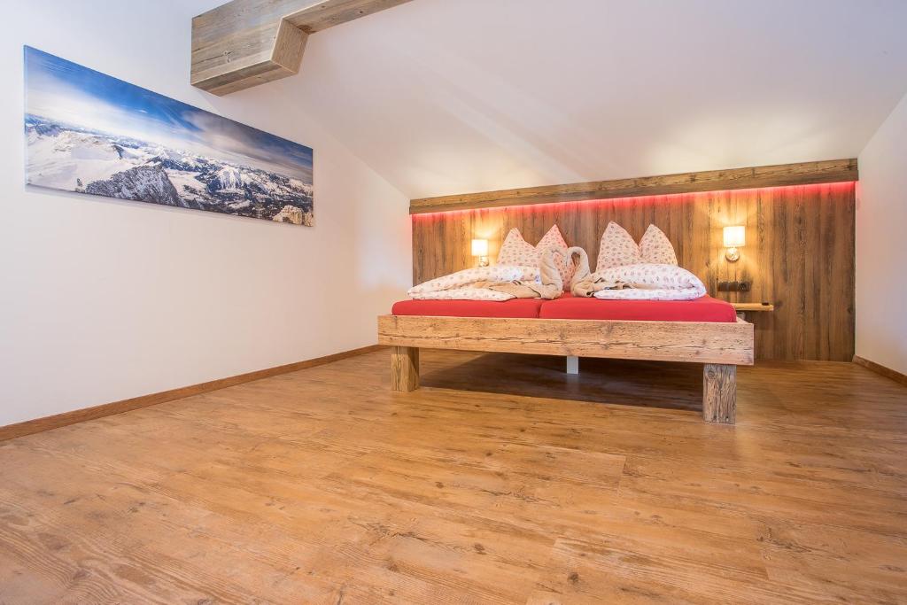 Posteľ alebo postele v izbe v ubytovaní Chalet Holzerstubn