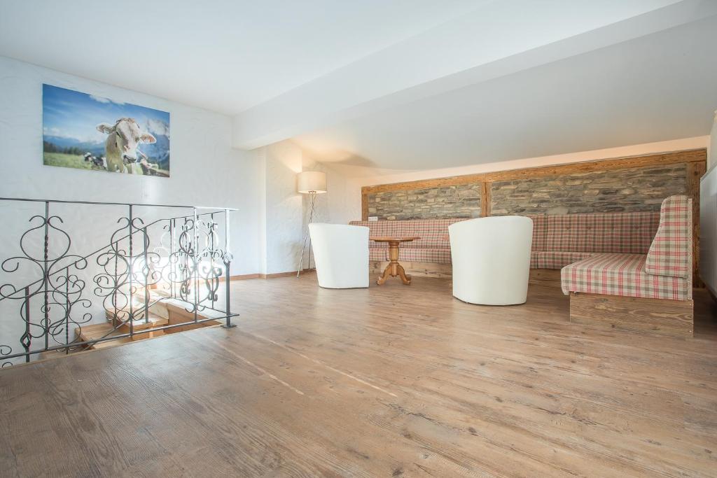 Posedenie v ubytovaní Chalet Holzerstubn