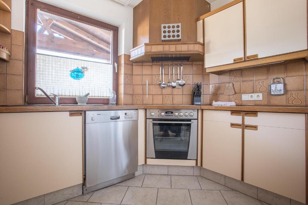 Kuchyňa alebo kuchynka v ubytovaní Chalet Holzerstubn