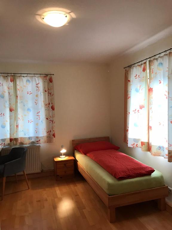 Postel nebo postele na pokoji v ubytování Frühstückspension Doris Eder