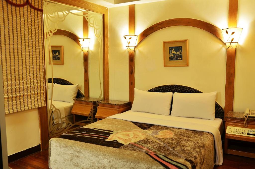 Postel nebo postele na pokoji v ubytování Family Hotel - Linsen
