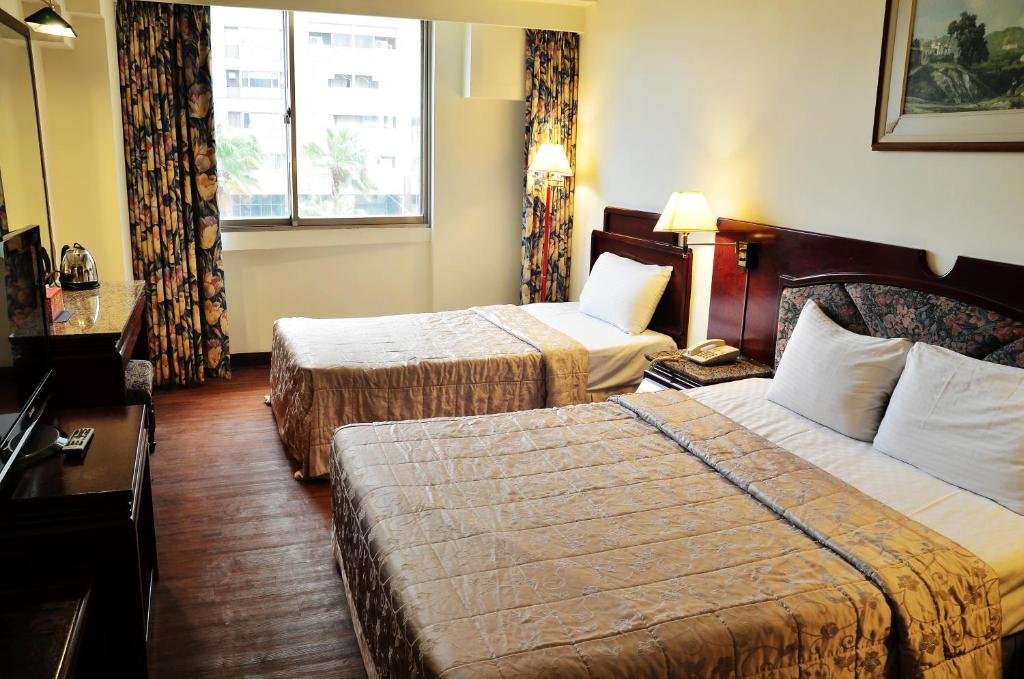 Postel nebo postele na pokoji v ubytování Family Hotel - Linsen