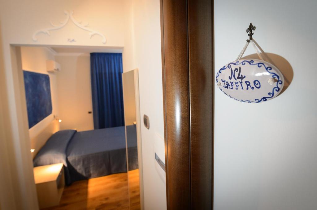 Postel nebo postele na pokoji v ubytování B&B Le Gemme
