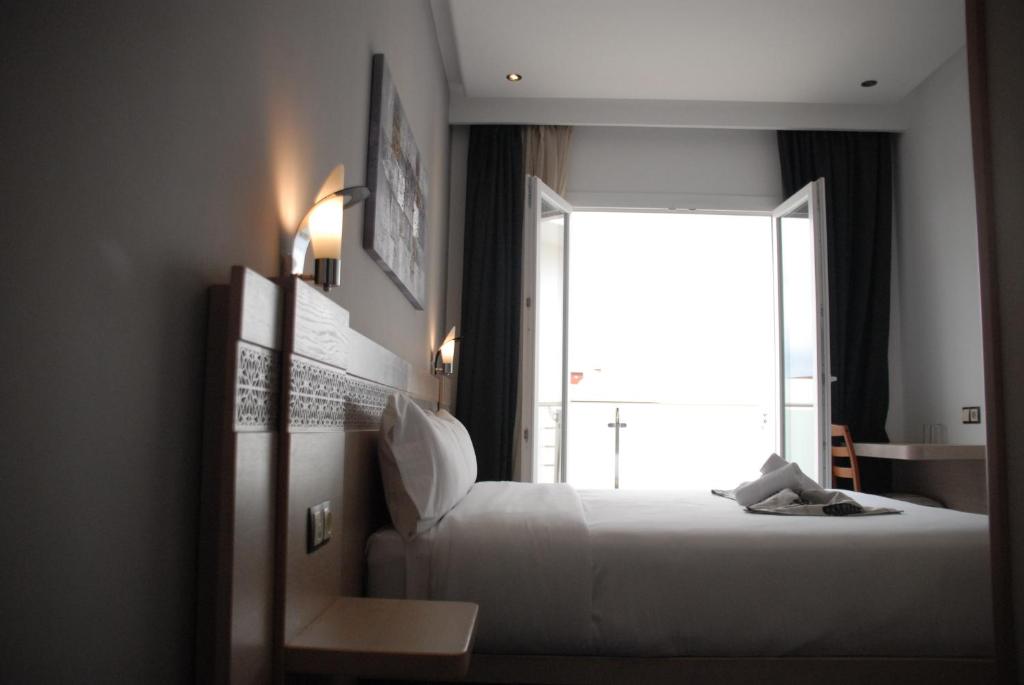 Voodi või voodid majutusasutuse Hotel A44 toas