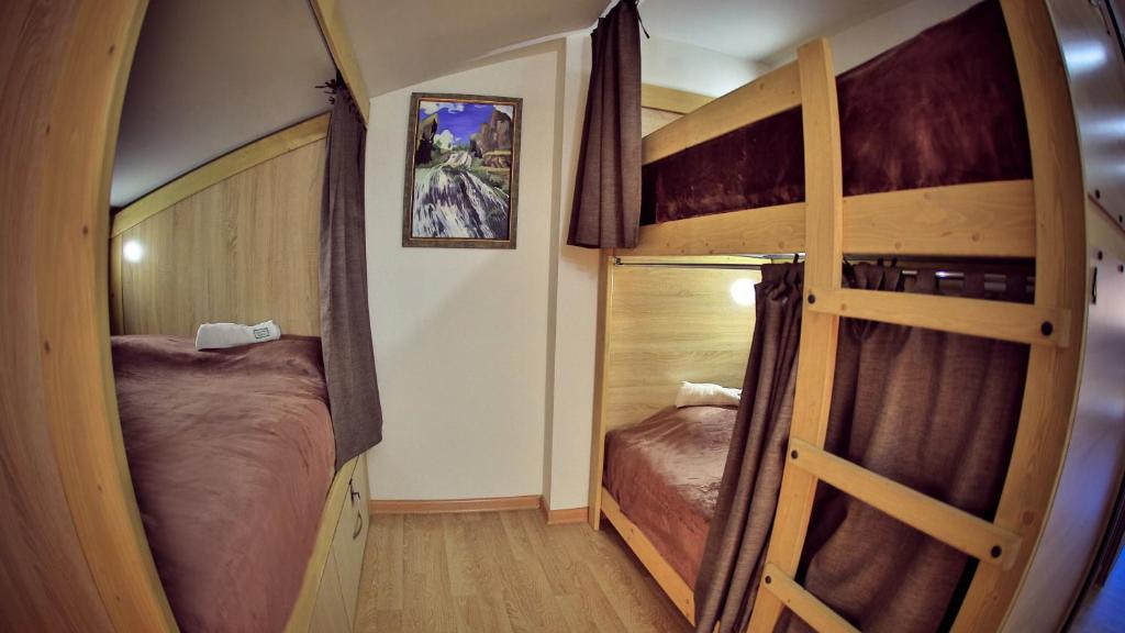 Postel nebo postele na pokoji v ubytování Hostel JUPITER