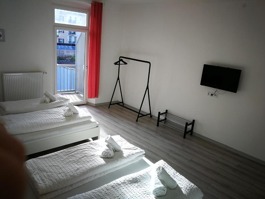 Posteľ alebo postele v izbe v ubytovaní Iceman Room's Central