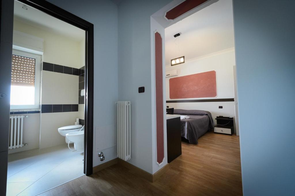 Postel nebo postele na pokoji v ubytování B&B Le Gemme