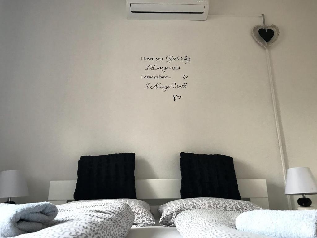 Postel nebo postele na pokoji v ubytování Rooms Deny