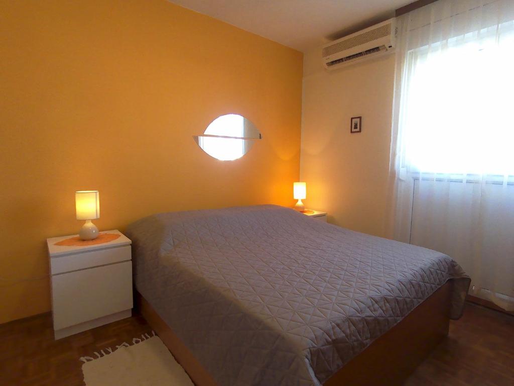 Posteľ alebo postele v izbe v ubytovaní Apartments Zara- ZD