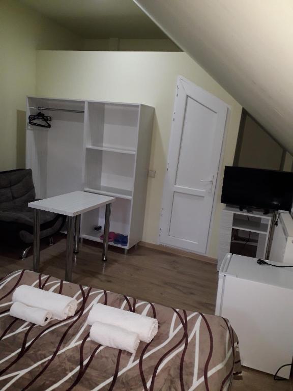 Kuchyň nebo kuchyňský kout v ubytování Hotel New Star