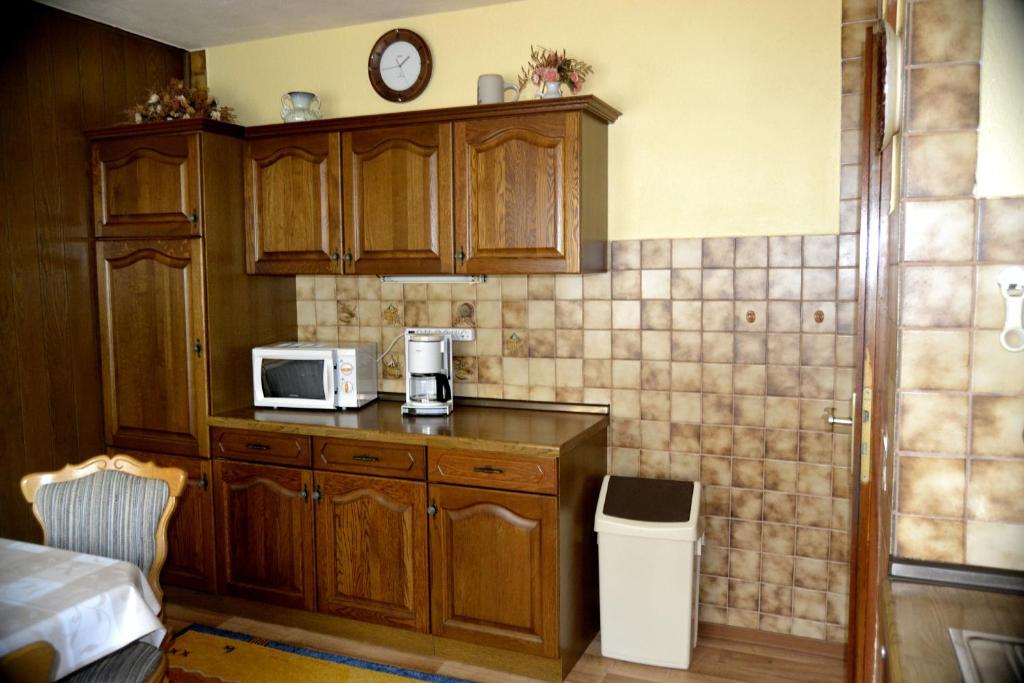 Kuchyň nebo kuchyňský kout v ubytování Haus Moser
