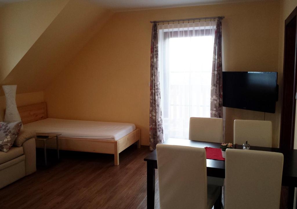 TV a/nebo společenská místnost v ubytování Apartmány Lucie