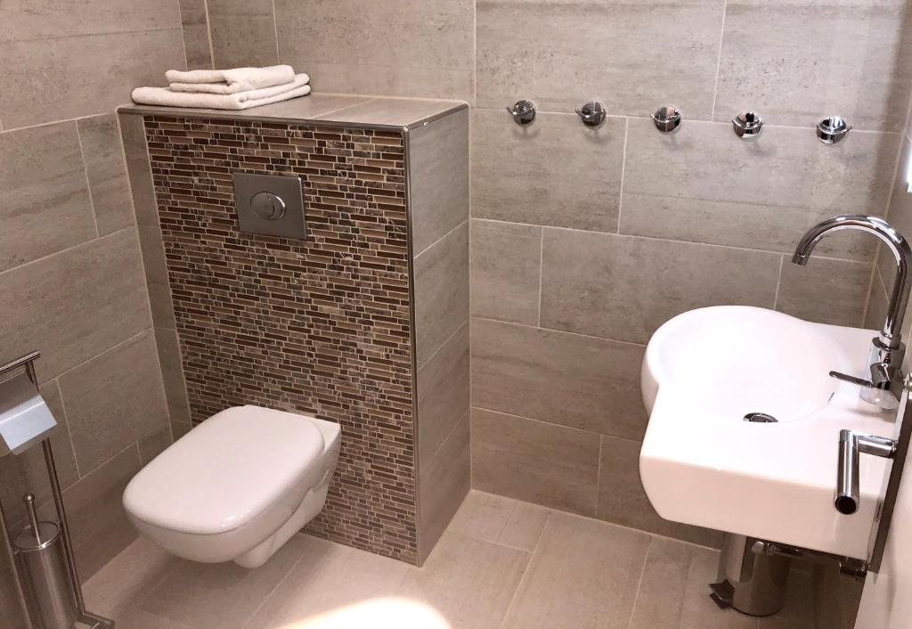 Koupelna v ubytování Wilsmann Apartmentvermietung