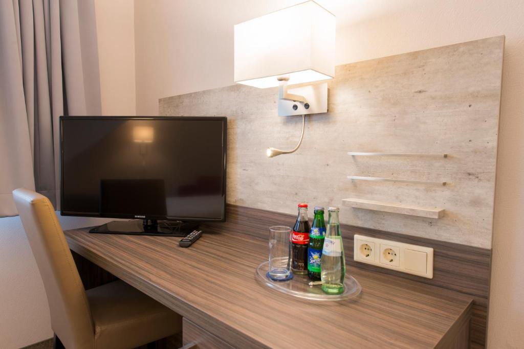 TV a/nebo společenská místnost v ubytování Hotel Westermann