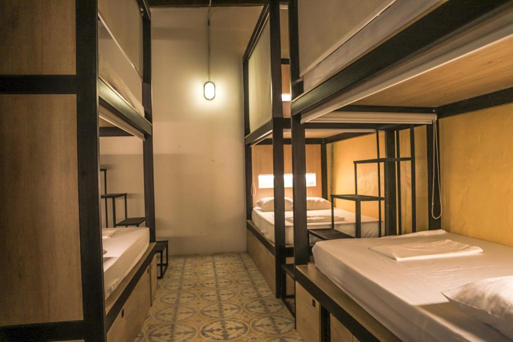 Postel nebo postele na pokoji v ubytování Baboon Hostel