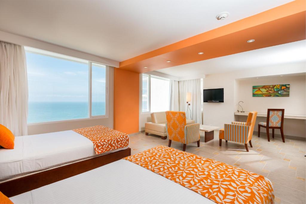 TV a/nebo společenská místnost v ubytování Hotel Dann Cartagena