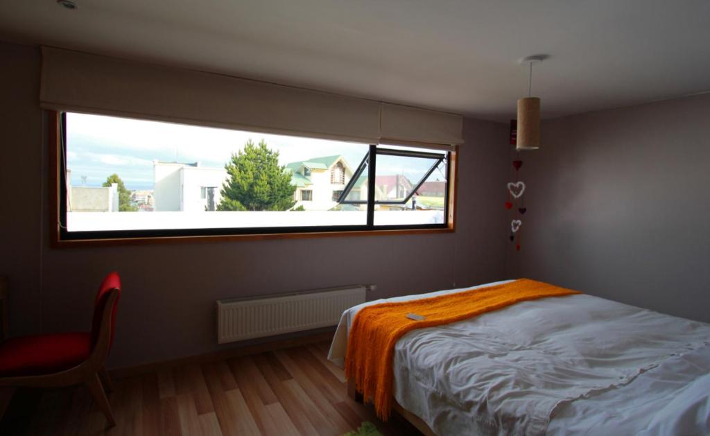Postel nebo postele na pokoji v ubytování Hotel Ilaia