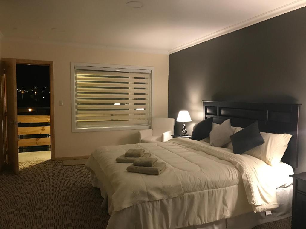 Cama ou camas em um quarto em SHEUEN PATAGONIA