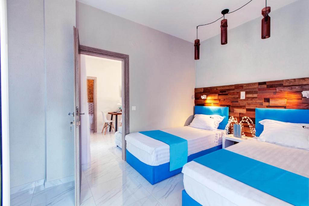 Postel nebo postele na pokoji v ubytování Avatel Eco Lodge