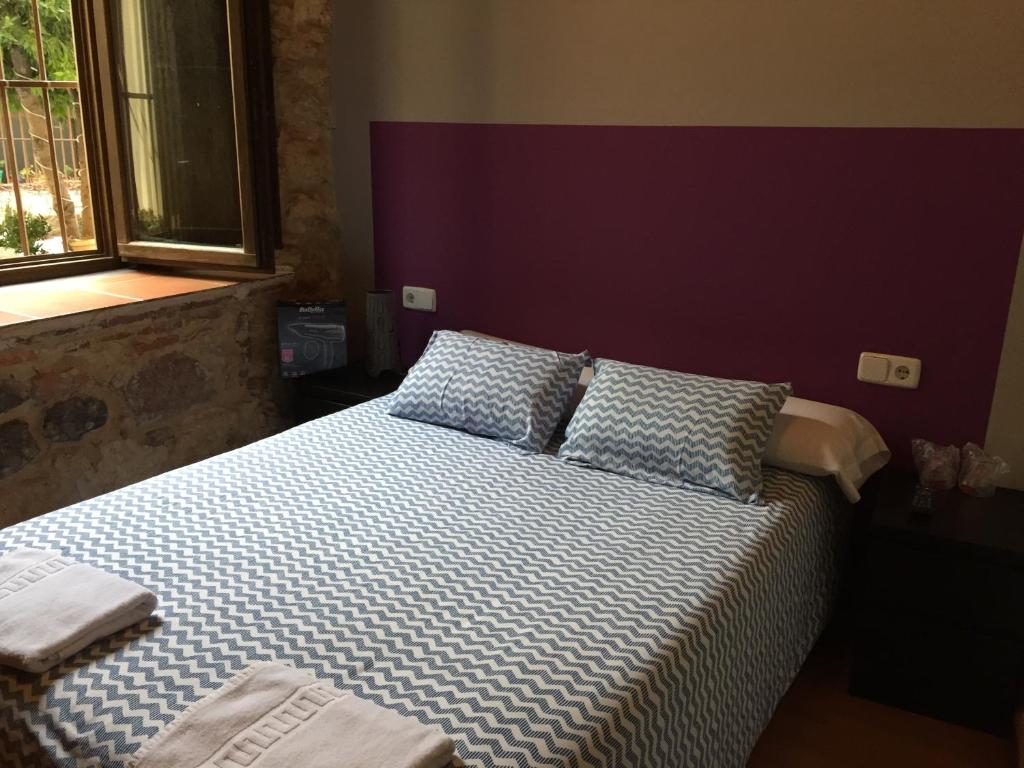 Postel nebo postele na pokoji v ubytování Hosteria Natura Plaza