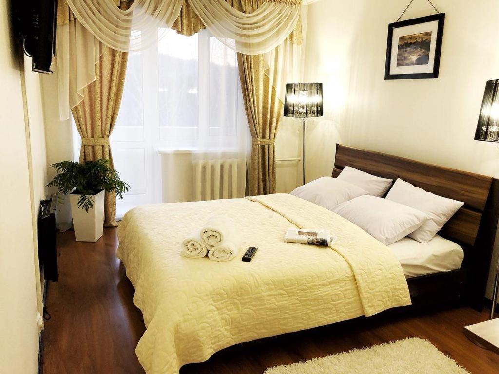 Кровать или кровати в номере Гостиница Райтекс