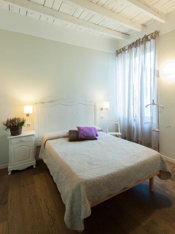 Posteľ alebo postele v izbe v ubytovaní Locanda Cece e Simo