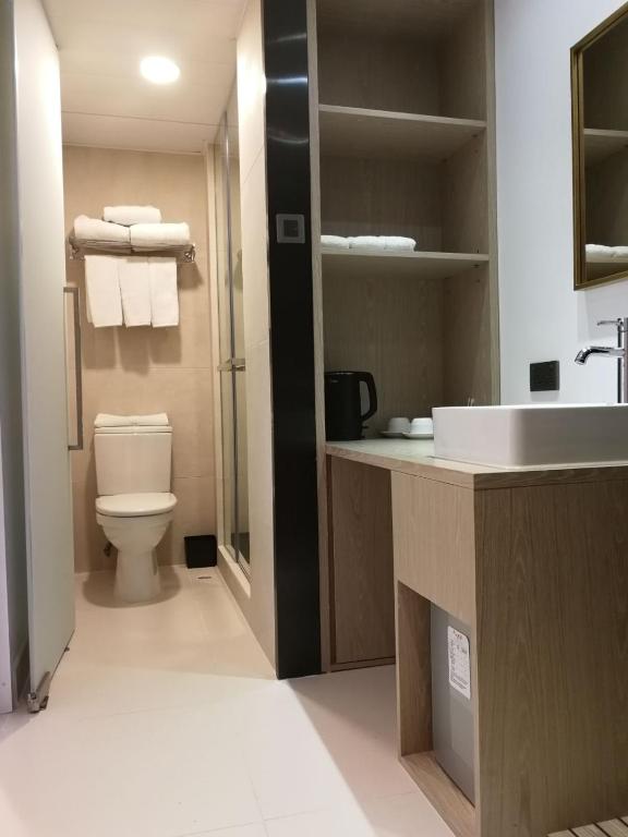 Koupelna v ubytování Wifi Boutique Hotel