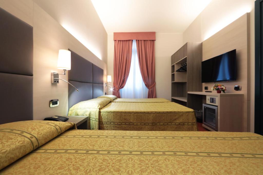 TV a/nebo společenská místnost v ubytování Hotel Campion