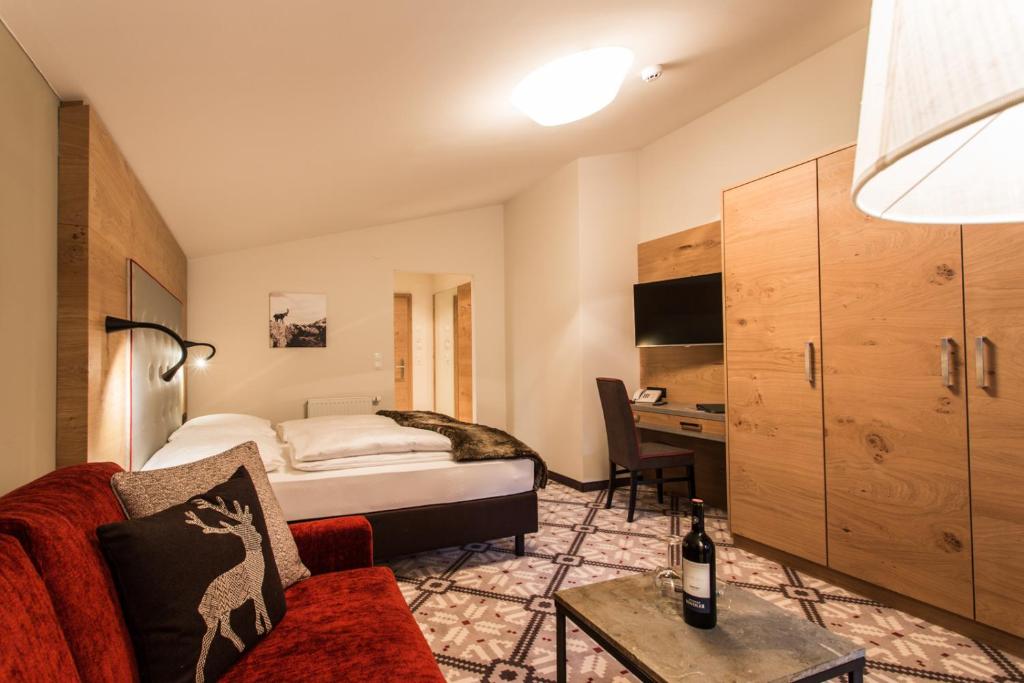Postel nebo postele na pokoji v ubytování Hotel Valentin