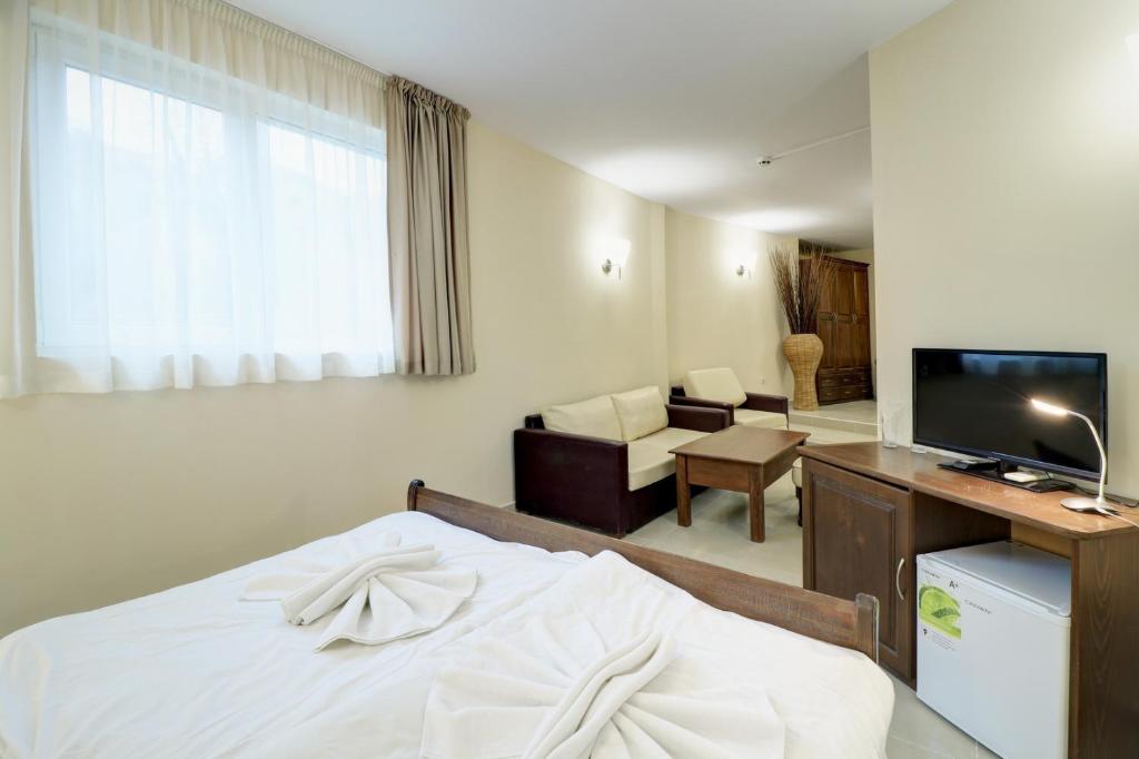 TV a/nebo společenská místnost v ubytování Family Hotel Jupiter