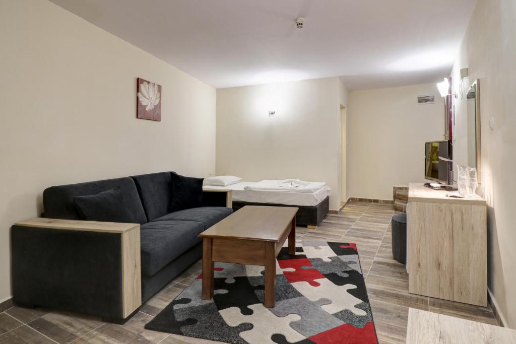 Postel nebo postele na pokoji v ubytování Family Hotel Jupiter