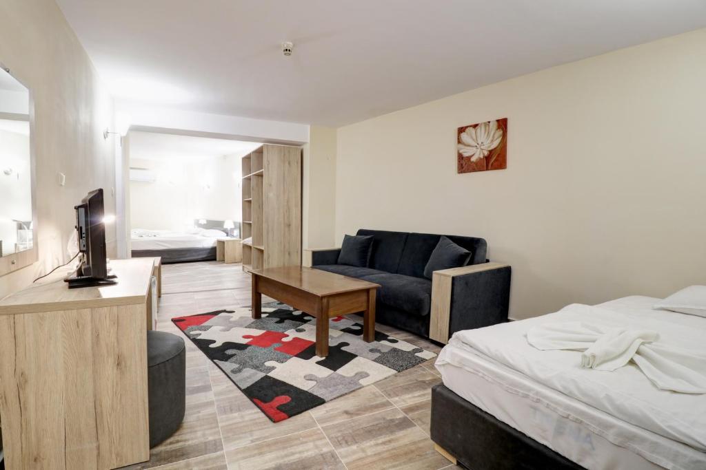 Postel nebo postele na pokoji v ubytování Family Hotel Jupiter