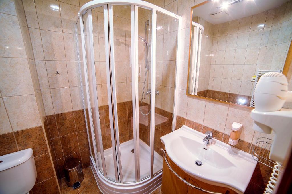 Koupelna v ubytování Hotel Tři Věžičky