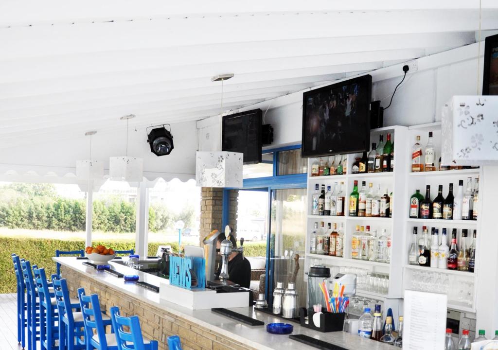 Lounge nebo bar v ubytování Tasmaria Aparthotel