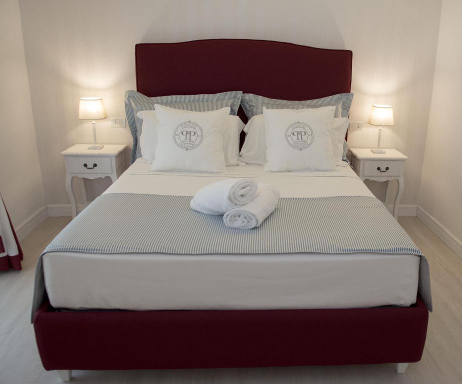 Łóżko lub łóżka w pokoju w obiekcie B&B Pompei Passion