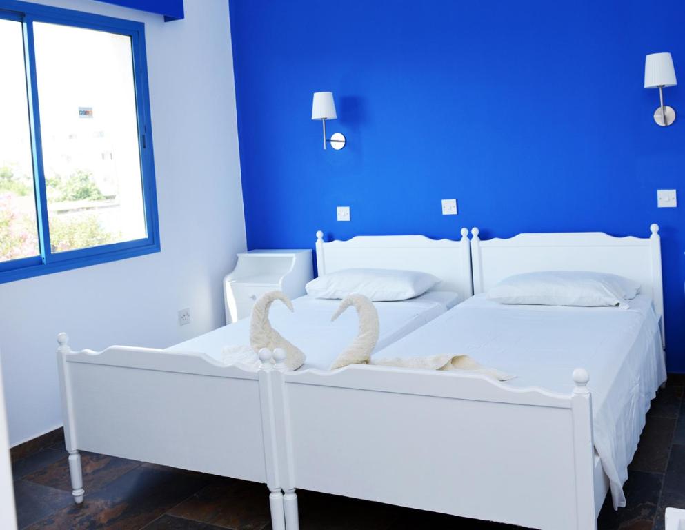 Postel nebo postele na pokoji v ubytování Tasmaria Aparthotel