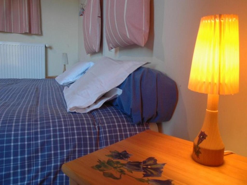 Postel nebo postele na pokoji v ubytování Chalet l'Angélique