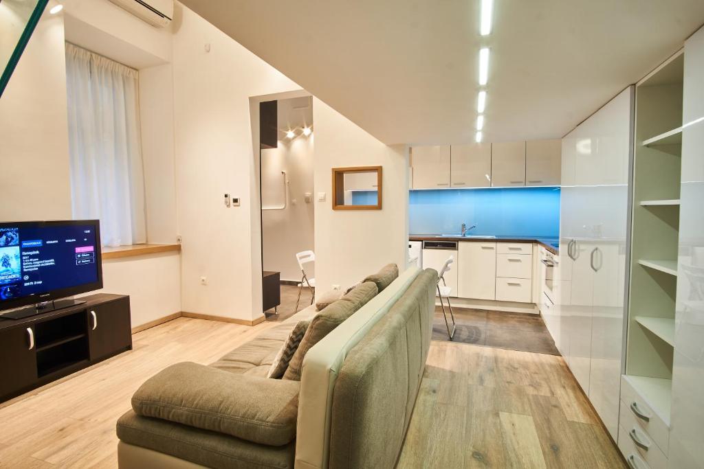 Televízia a/alebo spoločenská miestnosť v ubytovaní V27 Apartment | hostAID